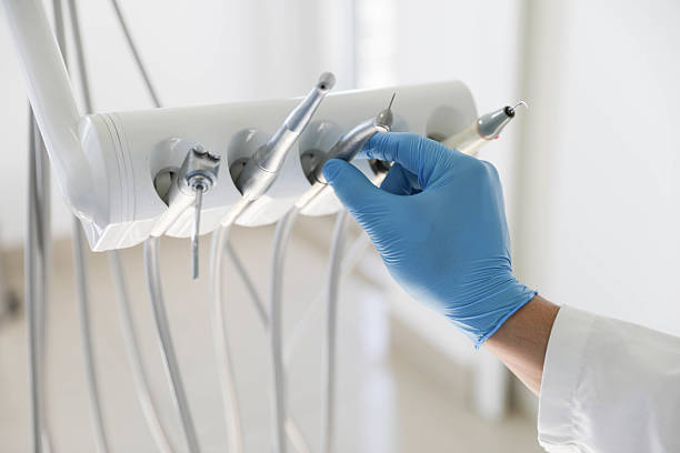 Professional Tooth Extraction technician working in South Alamo, TX